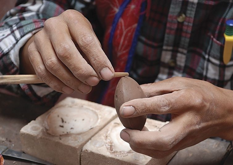 Making Ocarinas.jpg - Inca Trails in Peru - Meet the People Tours